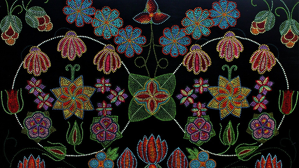 traditional metis dot art flowers and leafs in mirrored shape.