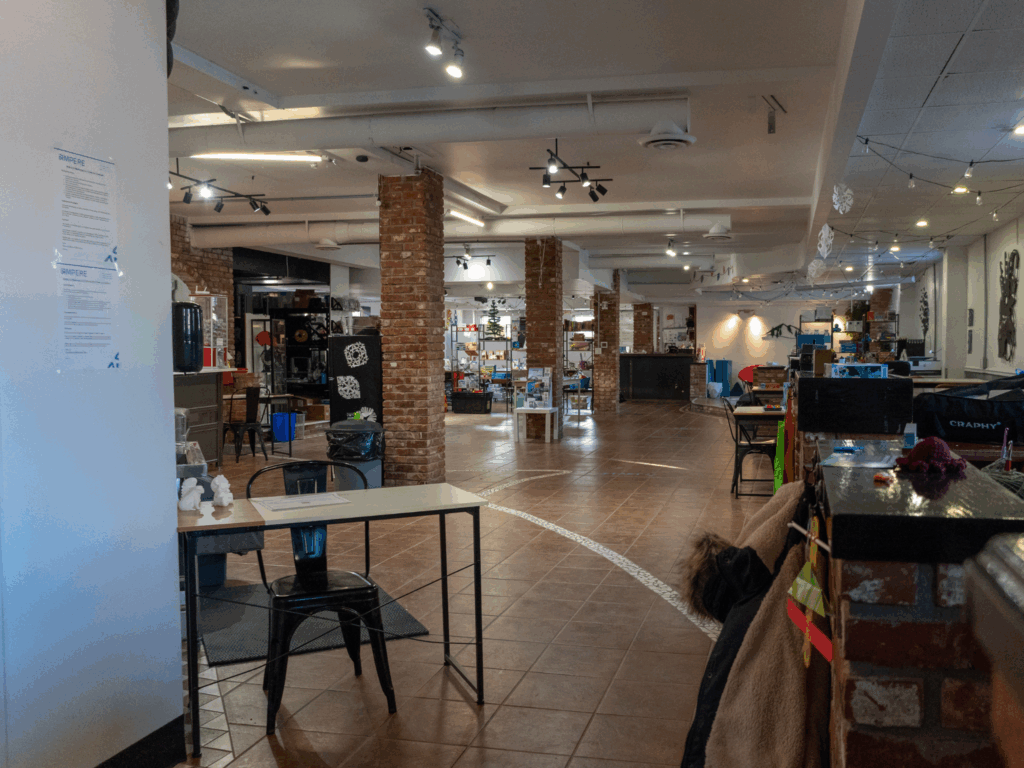 The view from the Main Street entrance as you walk into the Bathurst Makerspace and Skills Hub showing the open lay out, games and activities, and workspace.