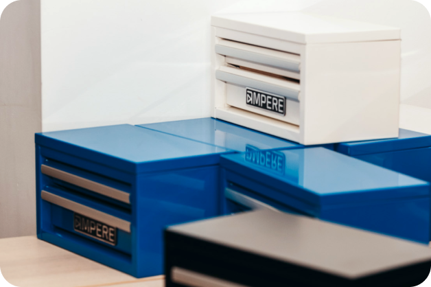 Small toolboxes stacked on top of each other.