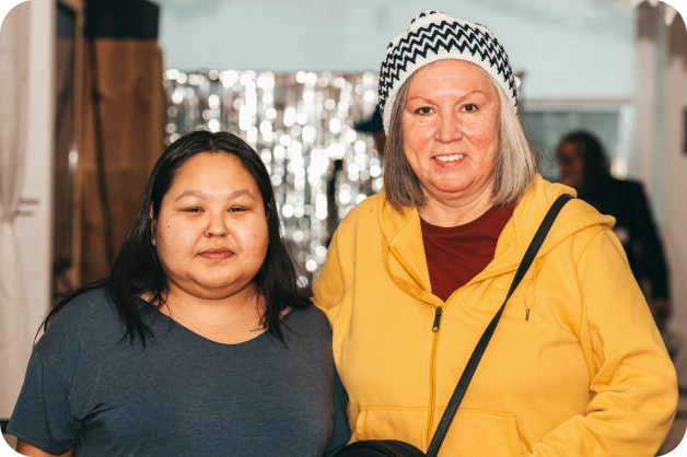 An Ampere staff member posing for a photo with a presenter from the Ampere All Staff 2026 event.