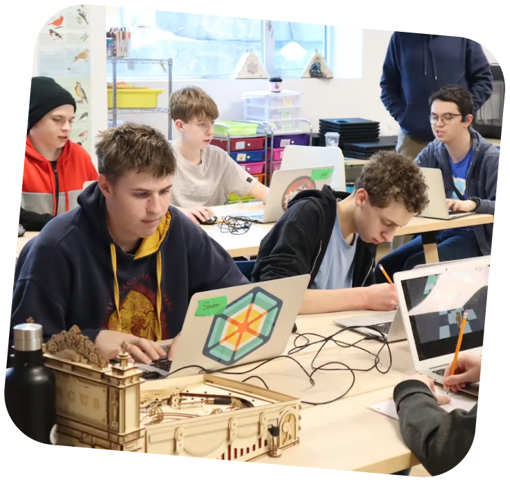 Students using laptops in the Lindsay Makerspace.