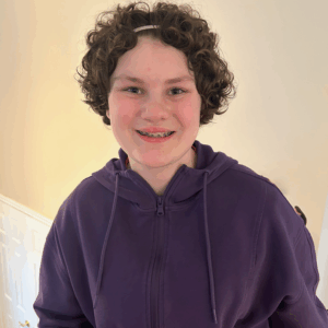 Wynn Vankooten portrait. She is smiling at the camera.