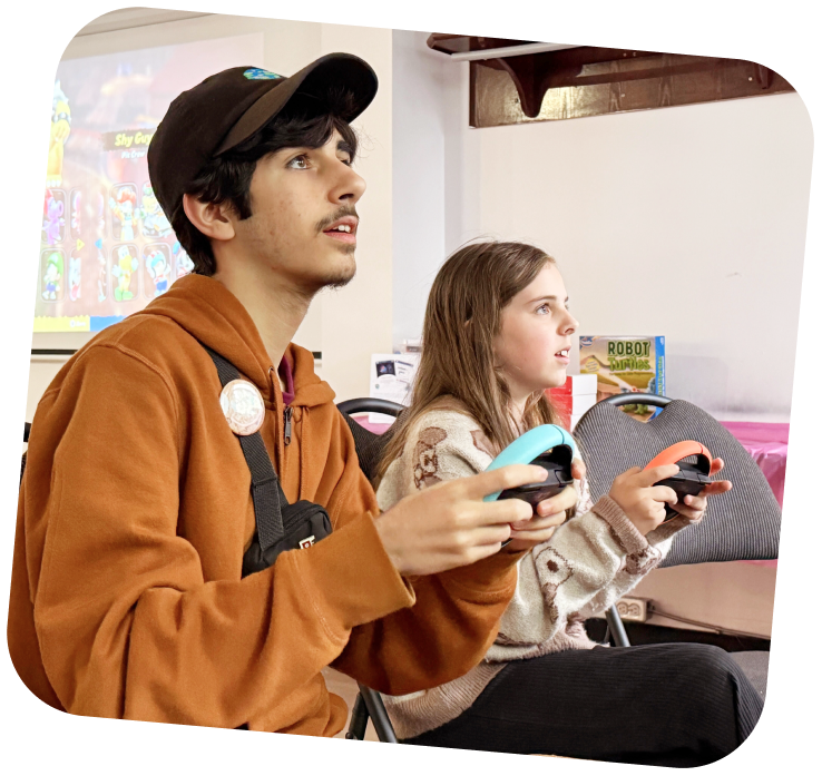 teens-playing-video-game-makerspace Two learners in the Bathurst makerspace playing video games. They are both looking towards the screen.