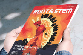 Hands-holding-a-Root-and-STEM-magazine