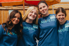 teen-girls-wearing-Ampere-shirts-and-smiling.