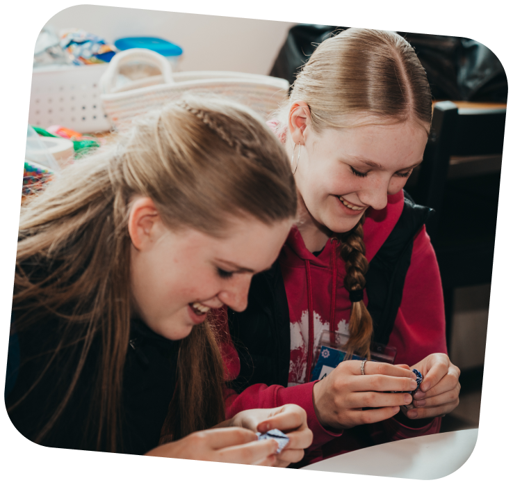 two-teens-doing-art-in-makerspace